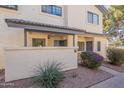 Lovely townhouse featuring a private entrance and vibrant landscaping at 1222 W Baseline Rd # 116, Tempe, AZ 85283