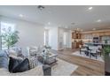 Bright living room with open floor plan featuring hardwood floors and comfortable furnishings at 2121 W Sonoran Desert Dr # 93, Phoenix, AZ 85085