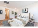 Serene main bedroom with a plush bed, soft lighting, and a tranquil ambiance for restful sleep at 2121 W Sonoran Desert Dr # 93, Phoenix, AZ 85085