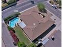 Bird's eye view of a home with a private pool, patio area, and well-maintained backyard at 2605 E Geneva Dr, Tempe, AZ 85282