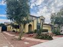 Two-story home with desert landscaping, a tile roof, and an arched entry at 3325 E Grand Canyon Dr, Chandler, AZ 85249