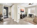 Inviting home entryway with decorative tile flooring and an adjacent bonus room at 3931 N 163Rd Dr, Goodyear, AZ 85395