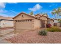 Single-Gathering home with a two-car garage, desert landscaping and a well-maintained front yard at 16737 N 157Th Ave, Surprise, AZ 85374