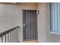 Secure front door with wrought iron and welcome mat in this well-maintained condo at 2929 W Yorkshire Dr # 2013, Phoenix, AZ 85027