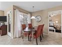 Inviting dining room with stylish furniture and ample natural light for a warm atmosphere at 17017 N 12Th St # 1106, Phoenix, AZ 85022