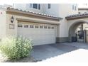 Attached two car garage, number 1151, providing convenient parking and curb appeal at 20802 N Grayhawk Dr # 1151, Scottsdale, AZ 85255