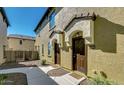 Inviting front entrance with desert landscaping and covered doorways at 2725 E Mine Creek Rd # 2186, Phoenix, AZ 85024