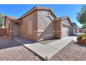 Charming single Gathering home, well manicured desert landscaping, and a spacious two-car garage at 43409 W Sagebrush Trl, Maricopa, AZ 85138
