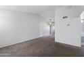 Bright living room with ceiling fan and carpet with easy patio access at 461 W Holmes Ave # 383, Mesa, AZ 85210