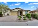 Inviting home with well-maintained landscaping and a spacious brick driveway leading to a two-car garage at 7769 S Reseda St, Gilbert, AZ 85298