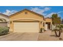 Charming single-story home with a two-car garage and well maintained front yard at 3252 E Fremont Rd, Phoenix, AZ 85042