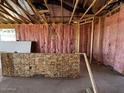 Interior view of a home under construction with wood framing and pink insulation at 4329 E Brook Lynn Pl, San Tan Valley, AZ 85143