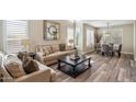 Inviting living room with high ceilings, neutral tones, and stylish decor at 16044 N 106Th Way, Scottsdale, AZ 85255