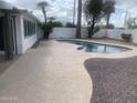 Backyard pool with patio and white block fence at 4410 N 20Th Ave, Phoenix, AZ 85015