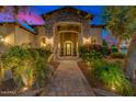 Inviting stone entryway with manicured landscaping leading to the decorative front door at 4431 E Gemini Pl, Chandler, AZ 85249