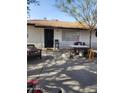 Charming exterior with a mature tree providing shade in the front yard at 4610 W Indianola Ave, Phoenix, AZ 85031