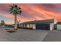 Single-story home with updated garage door, desert landscaping, and well-kept front yard at 1949 E Oxford Dr, Tempe, AZ 85283