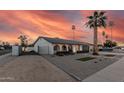 Beautiful single-story home with desert landscaping, arched entryway, and gated entrance at 1949 E Oxford Dr, Tempe, AZ 85283