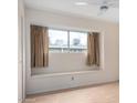 Bright bedroom featuring a window seat and neutral decor at 5339 N Black Canyon Hwy, Phoenix, AZ 85015
