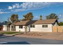 Well-maintained single-Gathering home with desert landscaping and a welcoming facade at 6320 N 30Th Dr, Phoenix, AZ 85017