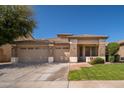 Charming single story home featuring a three-car garage, low maintenance landscaping, and a tile roof at 7214 N 88Th Ln, Glendale, AZ 85305