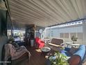 Inviting covered patio with comfortable seating, perfect for relaxing and entertaining guests at 8700 E University Dr # 649, Mesa, AZ 85207