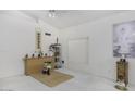 Airy bedroom with white walls and decor at 1009 E Brentrup Dr, Tempe, AZ 85283