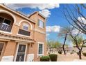 Beautiful two-story house featuring desert landscaping and a private balcony at 34924 N 30Th Ave, Phoenix, AZ 85086