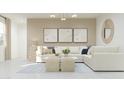 Bright and airy living room with neutral tones, stylish decor, and comfortable seating arrangement at 24863 N 167Th Dr, Surprise, AZ 85387