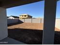 View of backyard area with block wall at 7272 E Hackamore Ln, San Tan Valley, AZ 85143