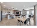 Open living space with modern kitchen, dining, and living areas at 734 E Doral Ave # 202, Gilbert, AZ 85297