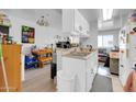 Functional kitchen featuring white cabinets and ample storage at 12123 W Bell Rd # 315, Surprise, AZ 85378