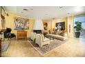 Bright living room boasting a fireplace, comfortable seating, and city views at 2323 N Central Ave # Ph-C, Phoenix, AZ 85004