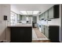 Well-lit kitchen with modern appliances, ample counter space, and a cozy breakfast bar for casual dining at 2810 S Emerson --, Mesa, AZ 85210
