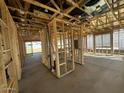 Interior view of a home under construction, showcasing the framing, plumbing and electrical at 4296 E Brook Lynn Pl, San Tan Valley, AZ 85140