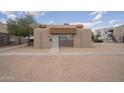 Inviting single-story home with a walkway leading to the front door at 4719 E Belleview St, Phoenix, AZ 85008