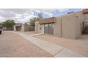 Street view of a cozy single-story home with a covered entrance at 4719 E Belleview St, Phoenix, AZ 85008