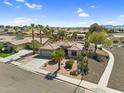 Beautiful aerial shot highlighting the meticulously designed community and desert landscaping of this beautiful home at 21141 E Stirrup St, Queen Creek, AZ 85142