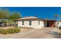 Cozy single-story home with a driveway, simple landscaping, and neutral stucco siding at 4539 N 9Th Ave, Phoenix, AZ 85013