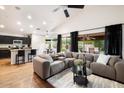 Open-concept living area featuring vaulted ceilings and a seamless transition to the kitchen and dining spaces at 7471 E Desert Vista Rd, Scottsdale, AZ 85255