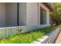 Landscaping design with colorful flowers adding beauty and charm to the exterior of the home at 1311 W Palo Verde Dr, Chandler, AZ 85224