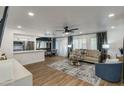 Spacious living room with ample natural light, modern decor, and open floor plan at 5209 N 24Th St # 104, Phoenix, AZ 85016