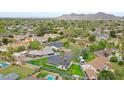 Beautiful aerial view of the property, highlighting the spacious lot, surrounding neighborhood, and nearby amenities at 7801 N 4Th Pl, Phoenix, AZ 85020