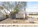 Contemporary home with desert landscaping, modern architecture, and clean lines, featuring a minimalist aesthetic and welcoming curb appeal at 2030 N 17Th Ave, Phoenix, AZ 85007