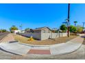 Corner lot, showcasing the home's desert landscaping, exterior, and location on the street at 3601 N 12Th St, Phoenix, AZ 85014