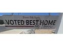 Pioneer Title Agency sign that says 'Voted Best Home on our' at 3932 N 306Th Ln, Buckeye, AZ 85396