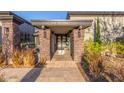 Inviting front entrance with stone pillars and tiled walkway at 9515 N 47Th St, Phoenix, AZ 85028