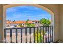 Picturesque view from the balcony of charming homes with terra cotta roofs on a sunny day at 12407 N 54Th Ave, Glendale, AZ 85304