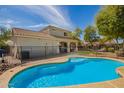 Inviting backyard pool perfect for relaxation, and a well-maintained patio area ideal for entertaining at 21402 E Alyssa Rd, Queen Creek, AZ 85142