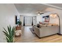 Inviting living room with natural light, featuring a comfortable sofa and stylish accents at 1015 E Concorda Dr, Tempe, AZ 85282